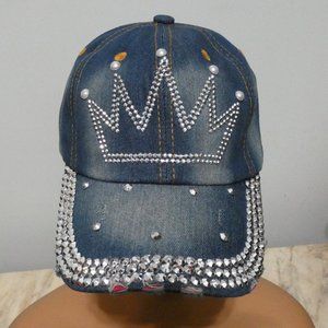 Frayed denim cap with crown tiara of sparkling silver metal faced riveted beads